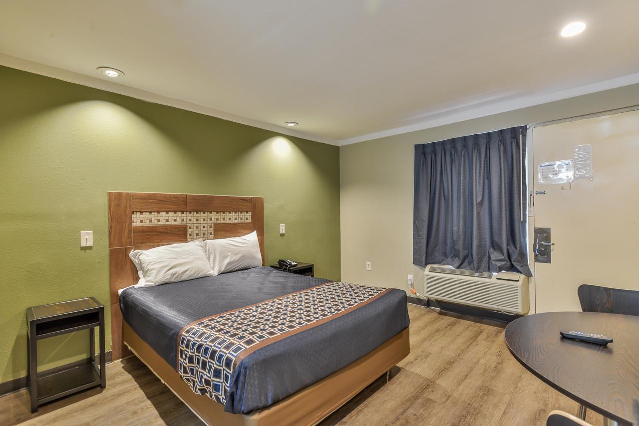 Budgetel Inn And Suites Роли Экстерьер фото
