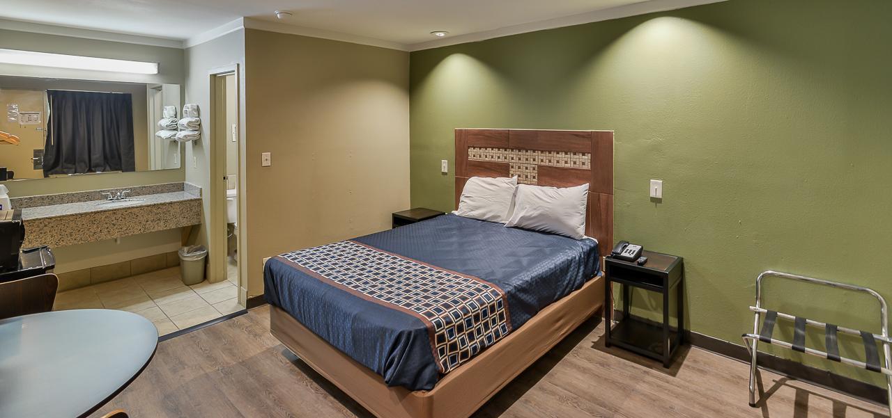 Budgetel Inn And Suites Роли Экстерьер фото