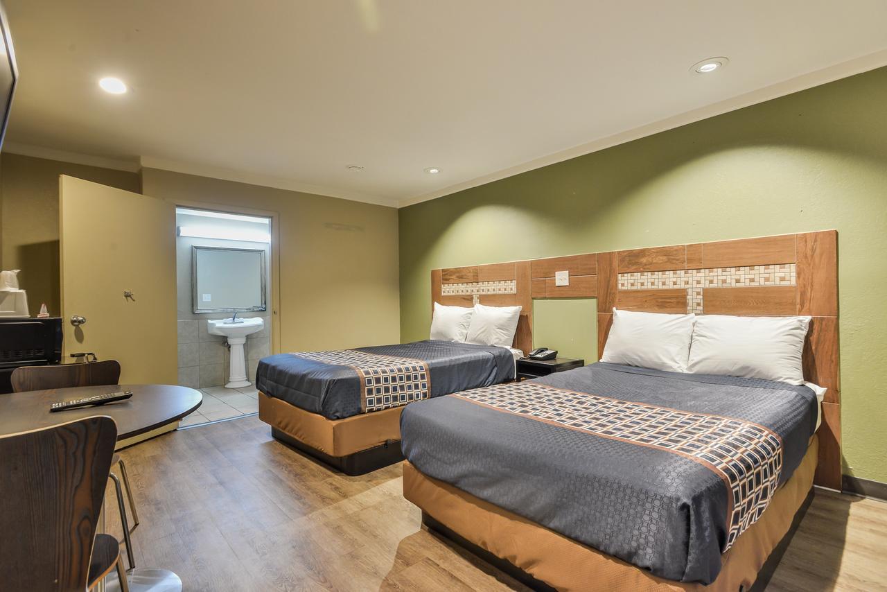 Budgetel Inn And Suites Роли Экстерьер фото