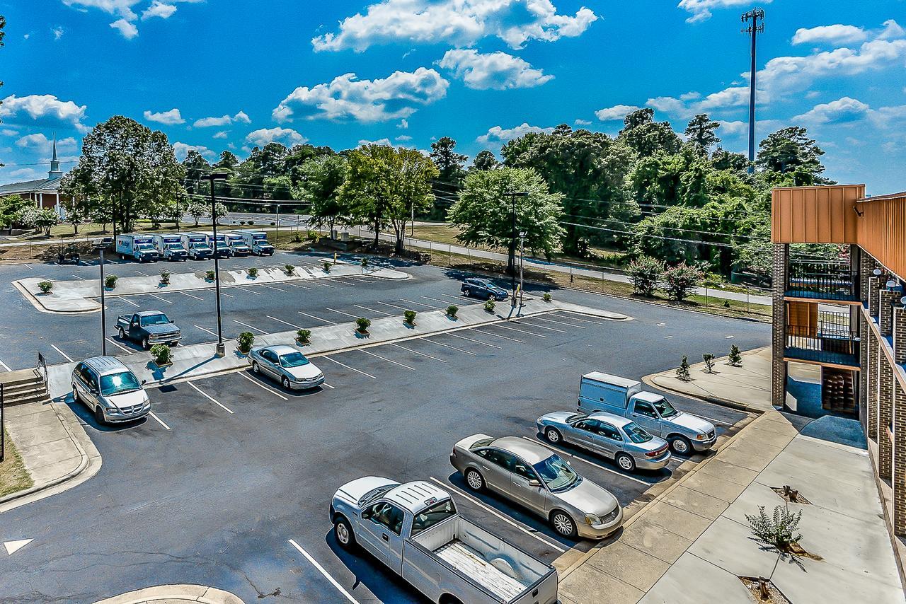 Budgetel Inn And Suites Роли Экстерьер фото